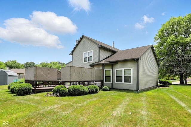 12316 Winding Creek Cir, Indianapolis, IN 46236 - rear view of property with a wooden deck, a lawn, a chimney, and a shingled roof