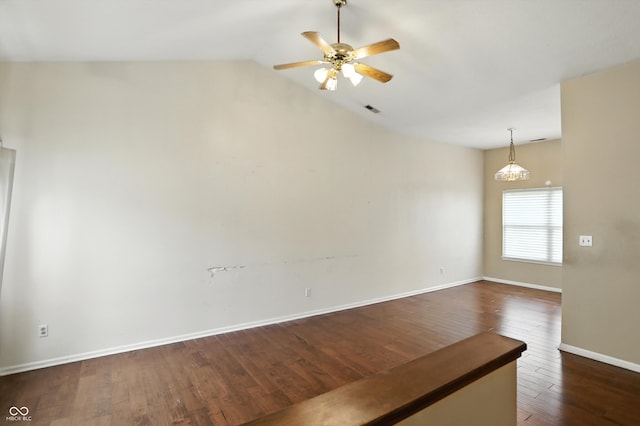 12316 Winding Creek Cir, Indianapolis, IN 46236 - empty room with dark wood-style flooring, a ceiling fan, and lofted ceiling