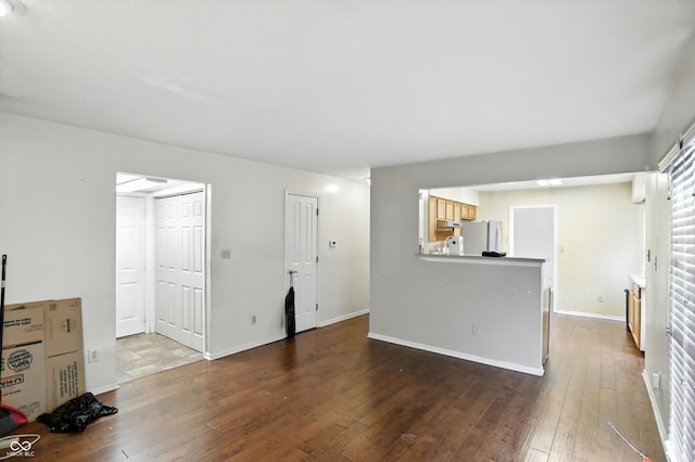 12316 Winding Creek Cir, Indianapolis, IN 46236 - unfurnished living room featuring wood-type flooring and baseboards