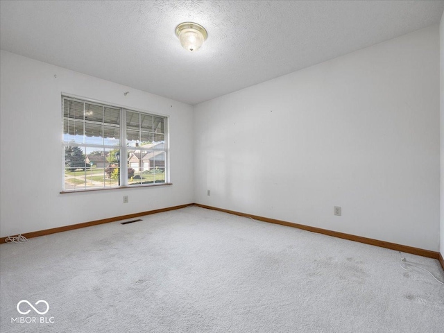 294 Keller Dr, Greenfield, IN 46140 - unfurnished room with carpet flooring and a textured ceiling