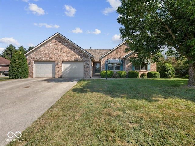 294 Keller Dr, Greenfield, IN 46140 - single story home with brick siding, concrete driveway, a front lawn, and a garage