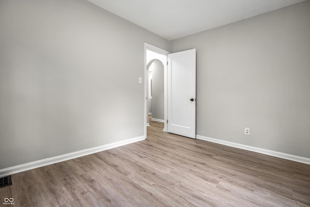 726 N Routiers Ave, Indianapolis, IN 46219 - spare room featuring wood finished floors