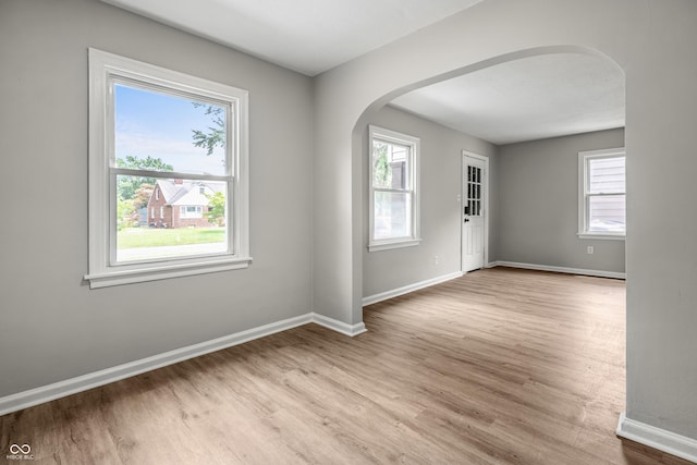 726 N Routiers Ave, Indianapolis, IN 46219 - foyer with arched walkways and wood finished floors