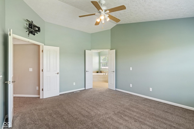 11761 Boothbay Ln, Fishers, IN 46037 - unfurnished bedroom with carpet floors, high vaulted ceiling, ensuite bathroom, a ceiling fan, and a textured ceiling