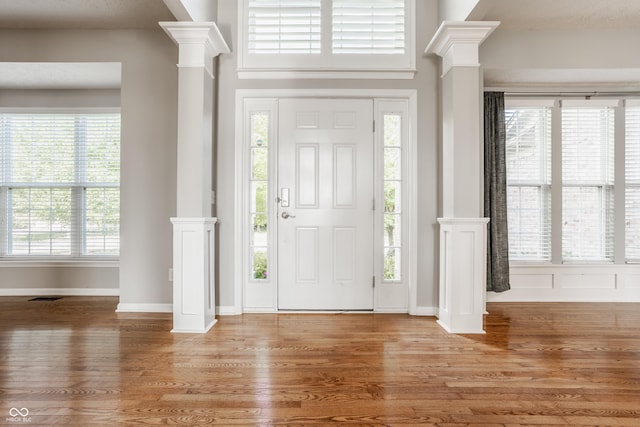 11761 Boothbay Ln, Fishers, IN 46037 - foyer featuring ornate columns and light wood-style flooring