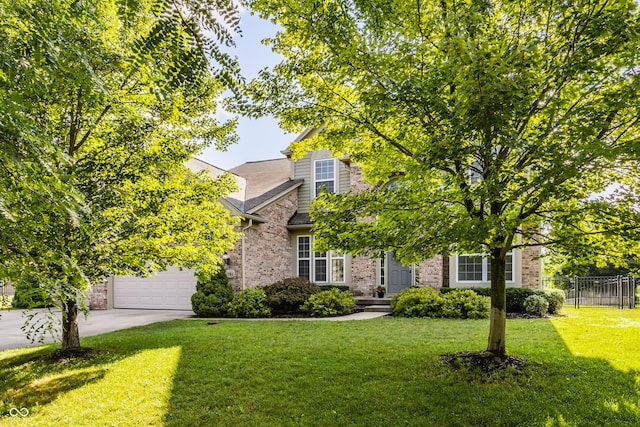 11761 Boothbay Ln, Fishers, IN 46037 - view of property hidden behind natural elements featuring driveway, brick siding, and an attached garage