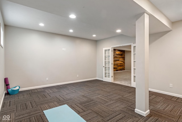 11761 Boothbay Ln, Fishers, IN 46037 - basement with dark colored carpet, french doors, and recessed lighting