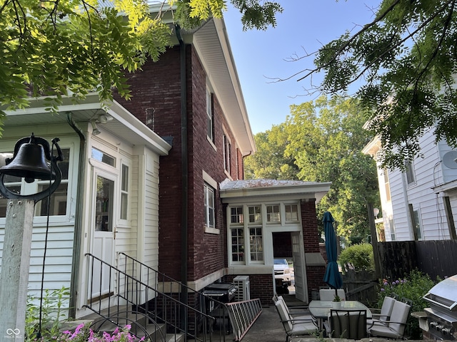 519 E Wabash Ave, Crawfordsville, IN 47933 - rear view of house with brick siding and entry steps