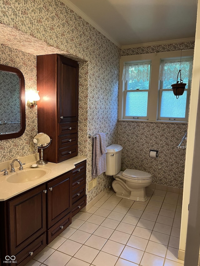 519 E Wabash Ave, Crawfordsville, IN 47933 - bathroom featuring ornamental molding, wallpapered walls, vanity, and tile patterned flooring