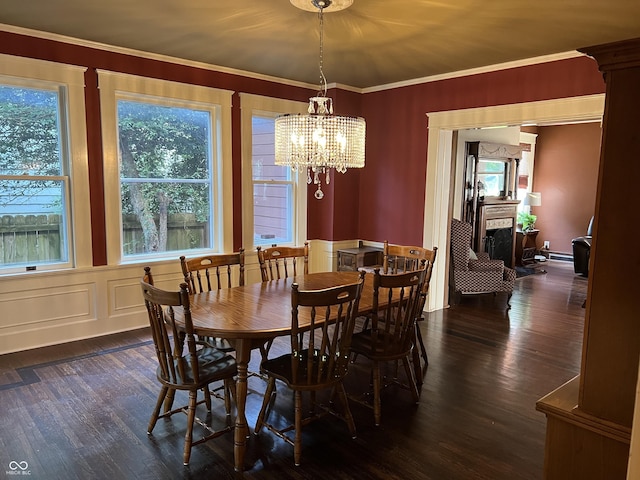 519 E Wabash Ave, Crawfordsville, IN 47933 - dining area with dark wood-style flooring, a chandelier, and ornamental molding
