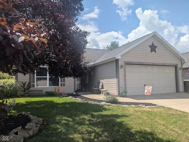 4124 Lofton Dr, Lafayette, IN 47909 - view of front of home featuring a garage, concrete driveway, a front yard, and a shingled roof