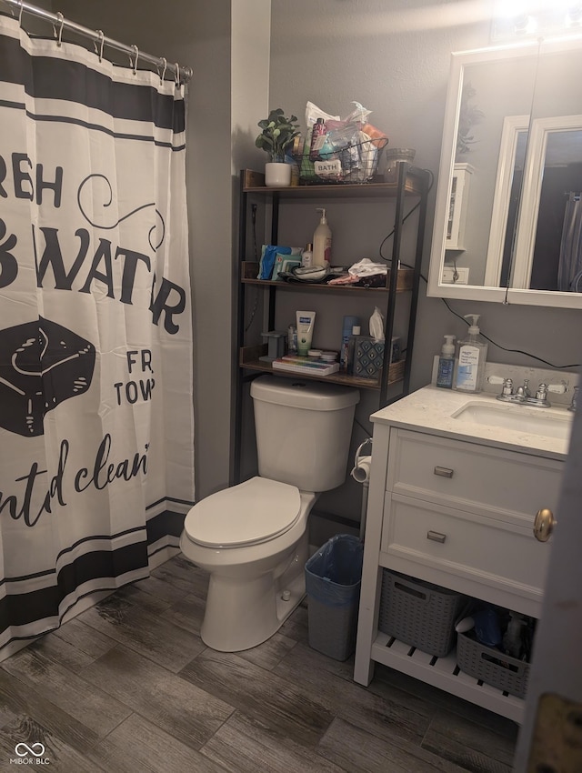 4124 Lofton Dr, Lafayette, IN 47909 - bathroom featuring wood finished floors, vanity, and a shower with shower curtain