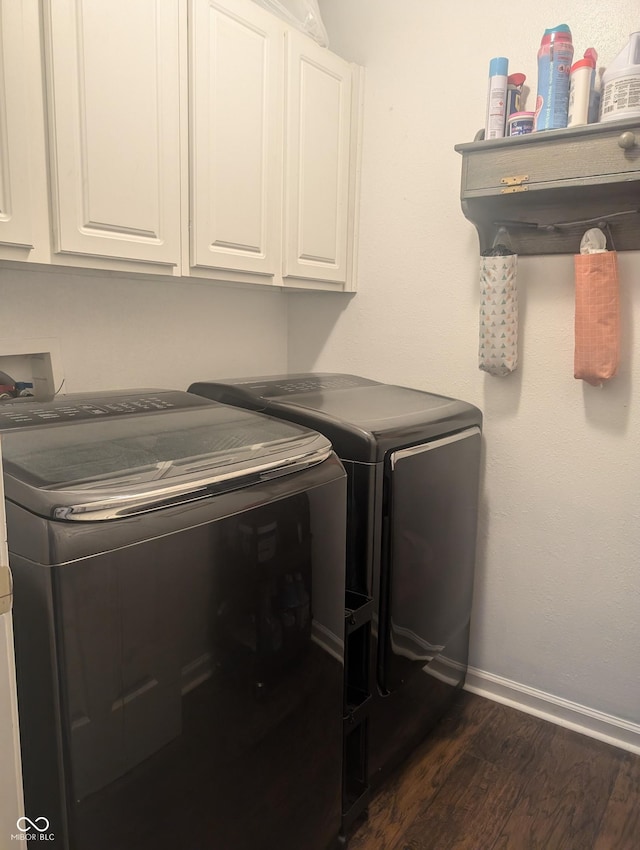 4124 Lofton Dr, Lafayette, IN 47909 - washroom featuring cabinet space, washing machine and dryer, and dark wood-style floors