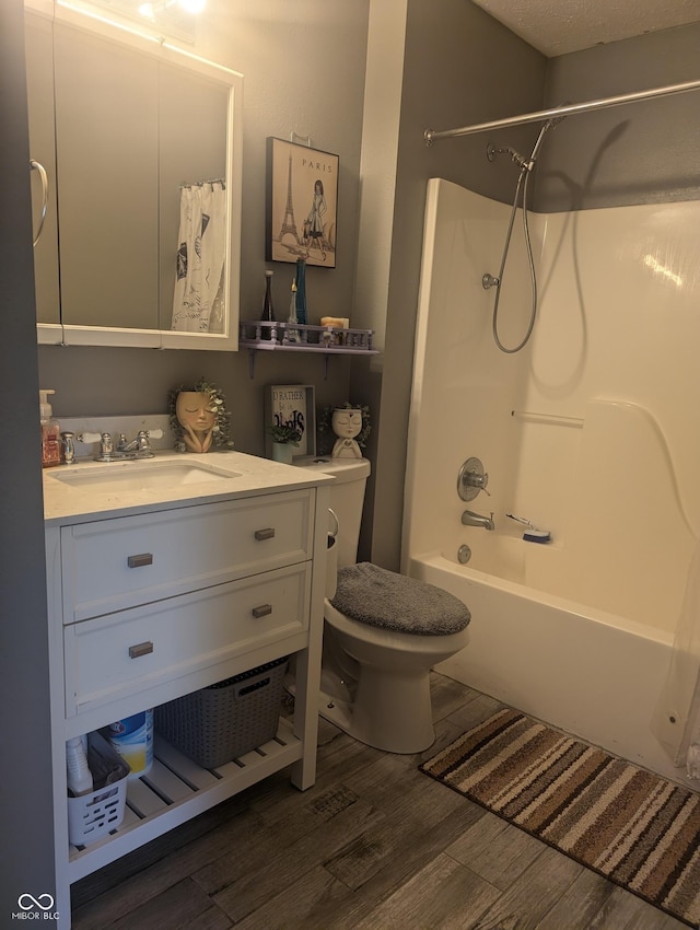 4124 Lofton Dr, Lafayette, IN 47909 - bathroom featuring wood finished floors, vanity, and shower / bath combo with shower curtain