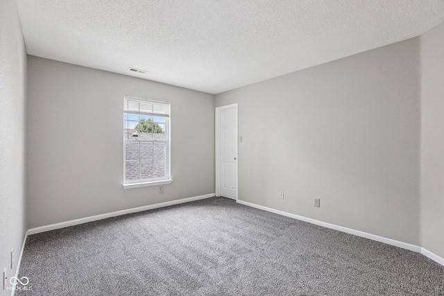 12632 Endurance Dr, Fishers, IN 46037 - carpeted empty room with baseboards and a textured ceiling