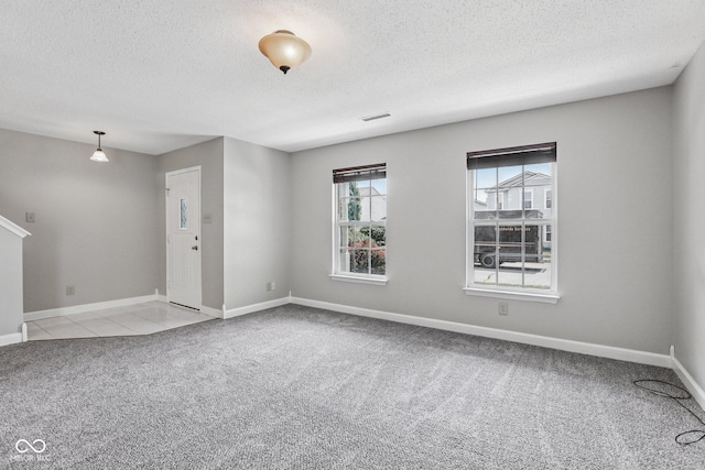 12632 Endurance Dr, Fishers, IN 46037 - unfurnished room with light carpet and a textured ceiling
