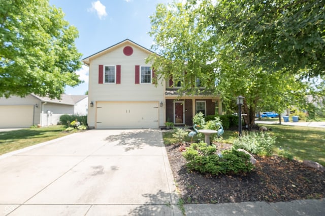 10301 Cerulean Dr, Noblesville, IN 46060 - traditional-style house with concrete driveway and an attached garage