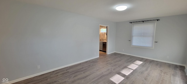2611 Taylor Rd, Columbus, IN 47203 - unfurnished room featuring dark wood-style flooring and baseboards