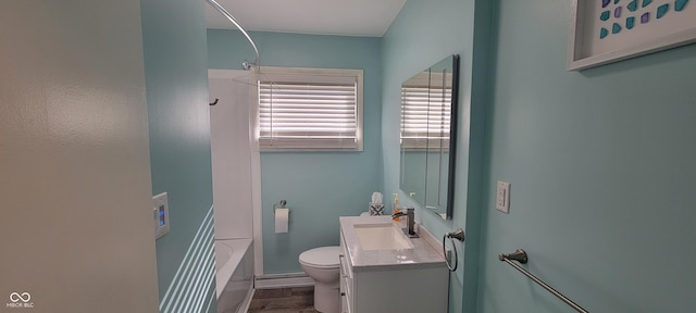 2611 Taylor Rd, Columbus, IN 47203 - full bath featuring shower / bathtub combination, vanity, and wood finished floors