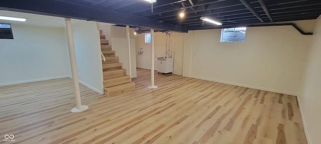 2611 Taylor Rd, Columbus, IN 47203 - basement with wood finished floors and stairs