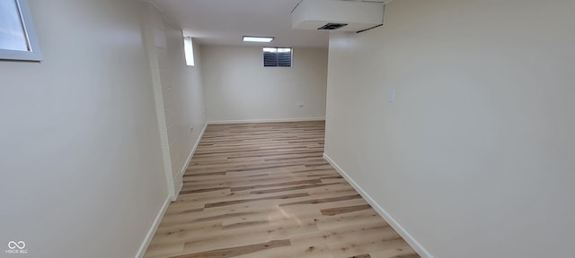 2611 Taylor Rd, Columbus, IN 47203 - hallway featuring light wood-type flooring and baseboards