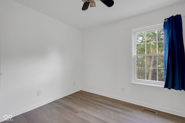 8850 Tanner Dr, Fishers, IN 46038 - spare room featuring wood finished floors and a ceiling fan
