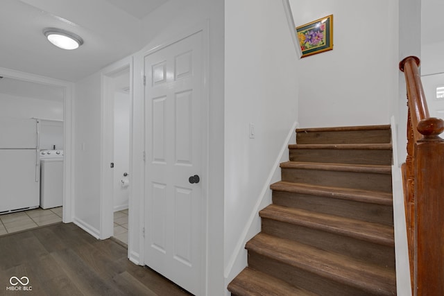 8850 Tanner Dr, Fishers, IN 46038 - stairs with washer / clothes dryer and wood finished floors