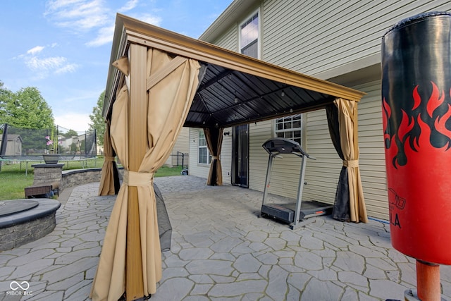8850 Tanner Dr, Fishers, IN 46038 - view of patio / terrace featuring a trampoline and a gazebo