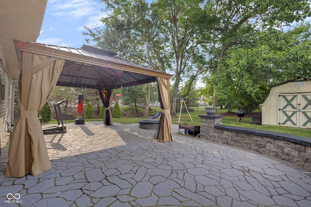 8850 Tanner Dr, Fishers, IN 46038 - view of patio / terrace with a gazebo, a shed, and a grill