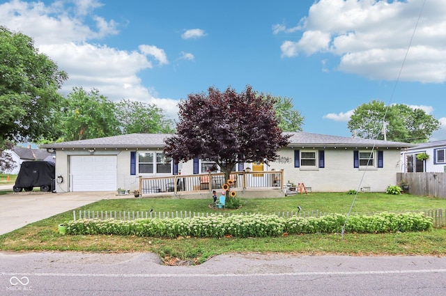 121 Apple St, Greenfield, IN 46140 - single story home with brick siding, a garage, and driveway