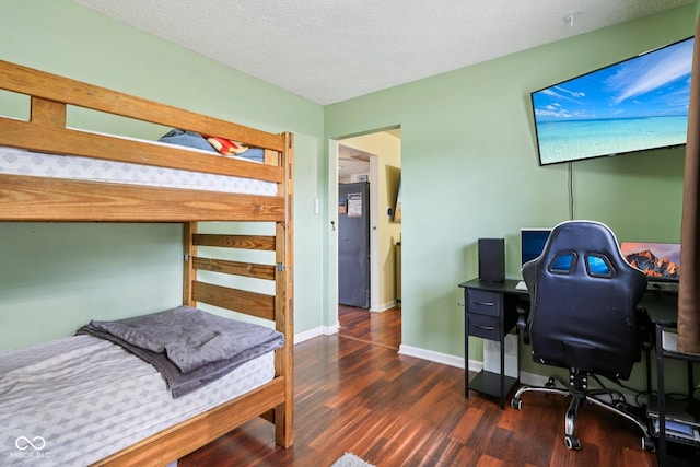 121 Apple St, Greenfield, IN 46140 - bedroom with wood finished floors, a desk, and a textured ceiling