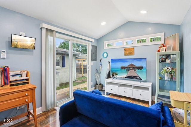 121 Apple St, Greenfield, IN 46140 - living area featuring wood finished floors, vaulted ceiling, and electric panel