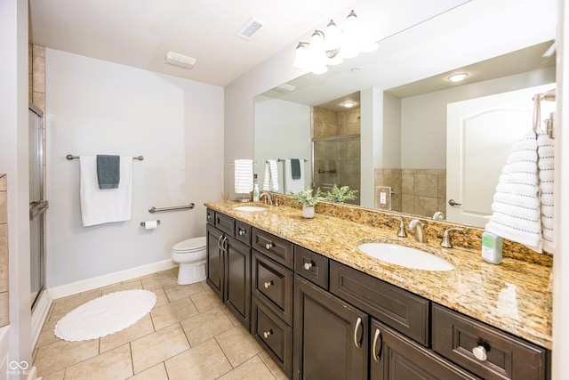 20971 Shoreline Ct Unit 408, Noblesville, IN 46062 - bathroom featuring a shower stall, double vanity, and tile patterned flooring