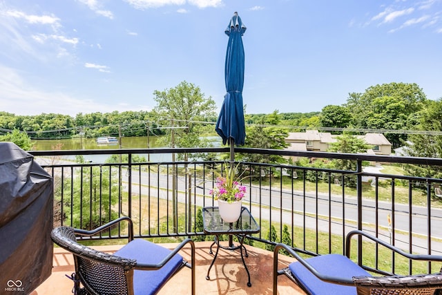 20971 Shoreline Ct Unit 408, Noblesville, IN 46062 - balcony with view of wooded area and a water view