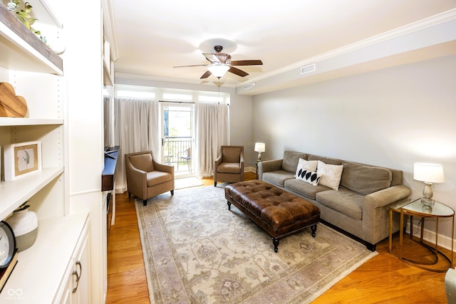 20971 Shoreline Ct Unit 408, Noblesville, IN 46062 - living room with a ceiling fan, crown molding, and light wood finished floors