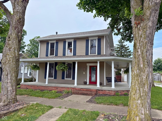416 6th St, Covington, IN 47932 - farmhouse featuring covered porch and ceiling fan