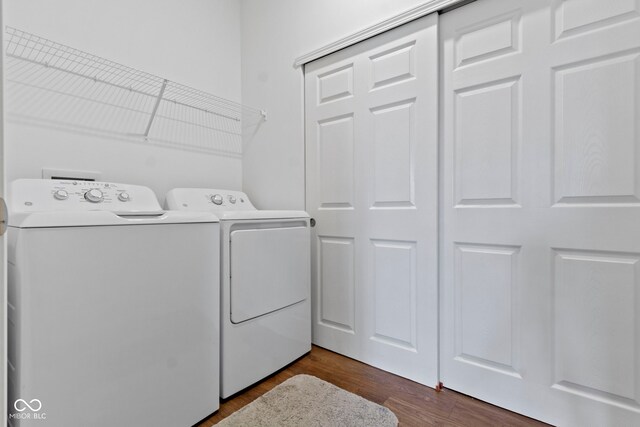 9801 Zion Way, Pendleton, IN 46064 - washroom with separate washer and dryer and dark wood finished floors