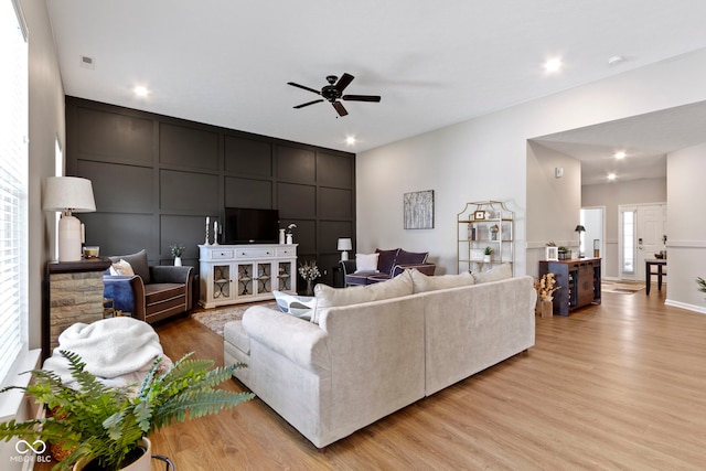 9801 Zion Way, Pendleton, IN 46064 - living area with light wood-style flooring, a ceiling fan, a decorative wall, and recessed lighting