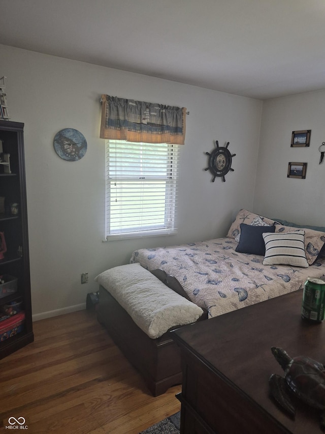 7802 Fall Creek Rd, Indianapolis, IN 46256 - bedroom featuring wood finished floors
