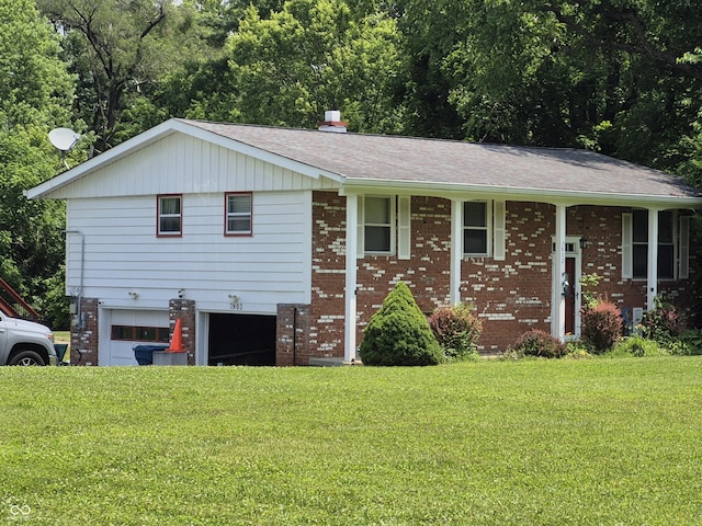 7802 Fall Creek Rd, Indianapolis, IN 46256 - view of front of home with an attached garage, brick siding, a front lawn, and a shingled roof