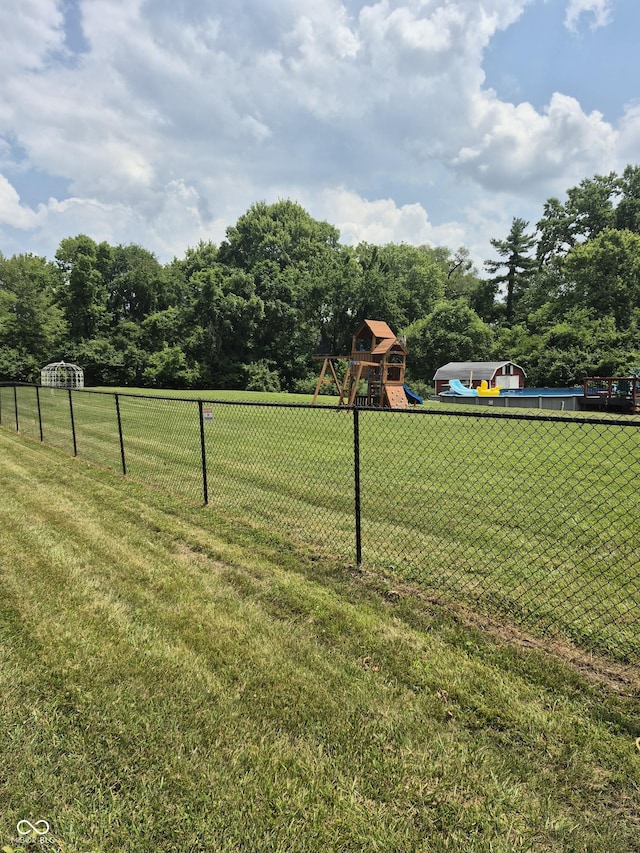 7802 Fall Creek Rd, Indianapolis, IN 46256 - view of yard featuring a playground
