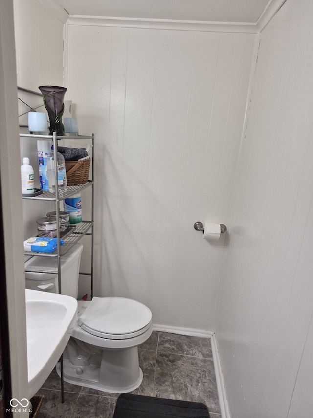 7802 Fall Creek Rd, Indianapolis, IN 46256 - bathroom with toilet and baseboards