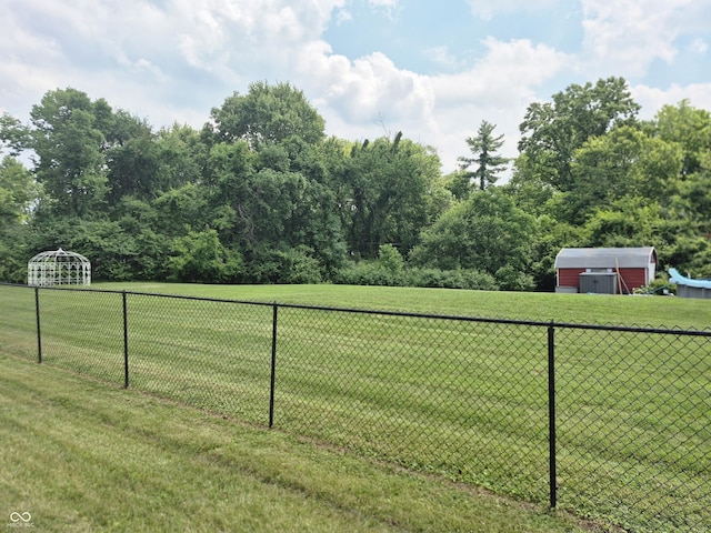 7802 Fall Creek Rd, Indianapolis, IN 46256 - view of yard with an outdoor structure