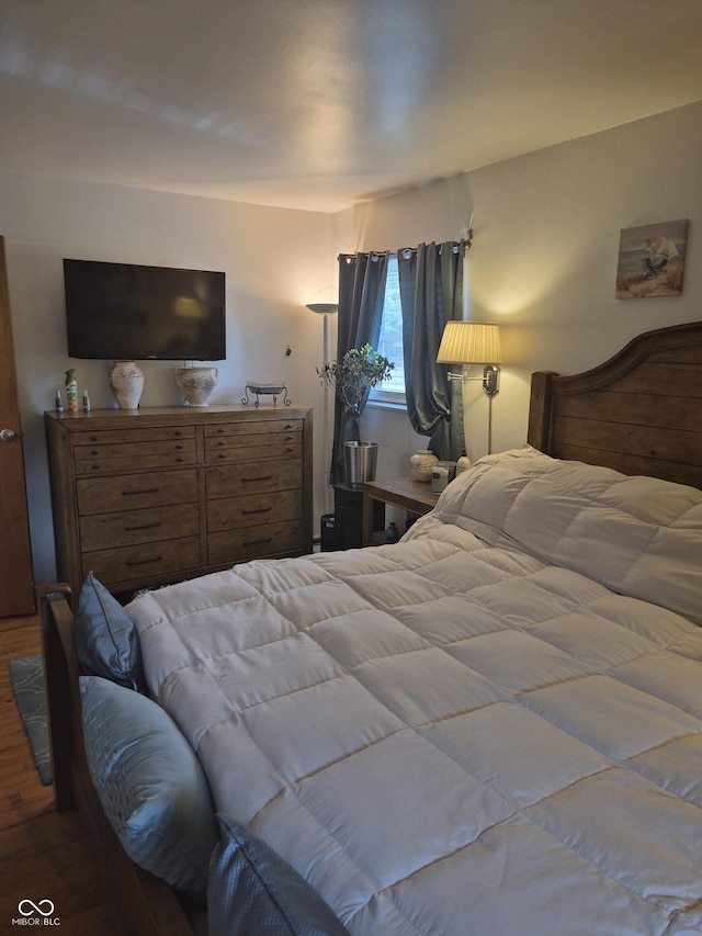7802 Fall Creek Rd, Indianapolis, IN 46256 - bedroom featuring wood finished floors