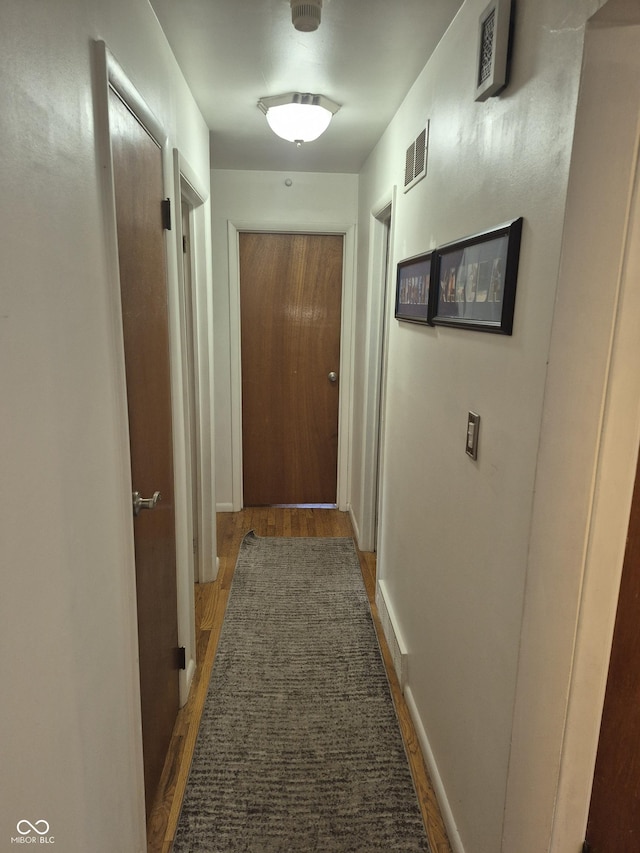 7802 Fall Creek Rd, Indianapolis, IN 46256 - hall featuring wood finished floors