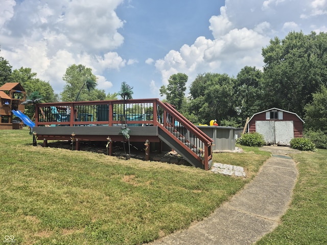 7802 Fall Creek Rd, Indianapolis, IN 46256 - view of front of property with a storage unit, a front yard, a wooden deck, and stairway