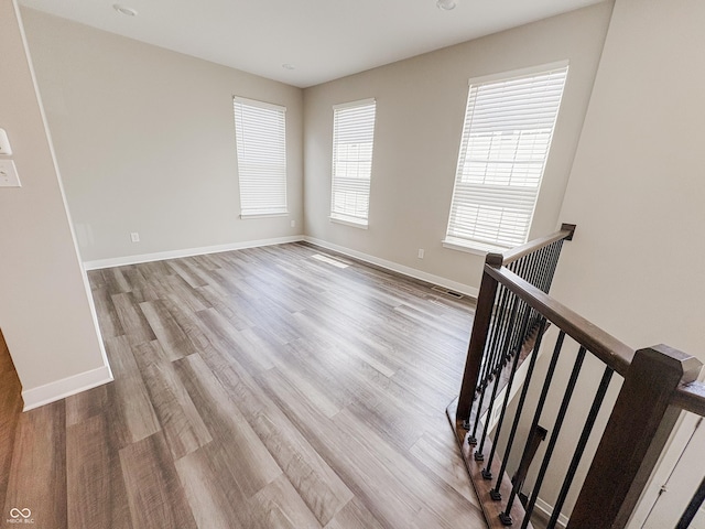3522 Brampton Ln, Westfield, IN 46074 - spare room with wood finished floors and baseboards