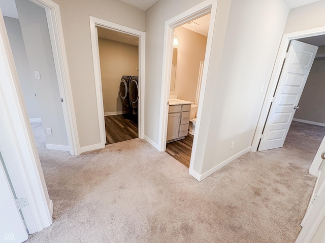 3522 Brampton Ln, Westfield, IN 46074 - corridor featuring washing machine and clothes dryer and light colored carpet