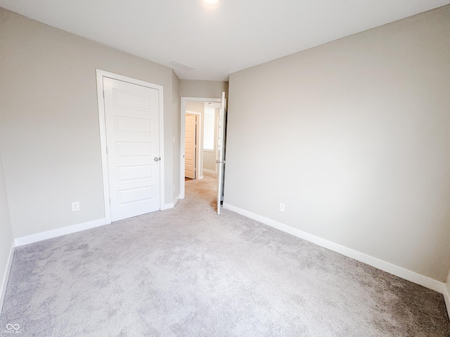 3522 Brampton Ln, Westfield, IN 46074 - unfurnished bedroom featuring light carpet and a closet