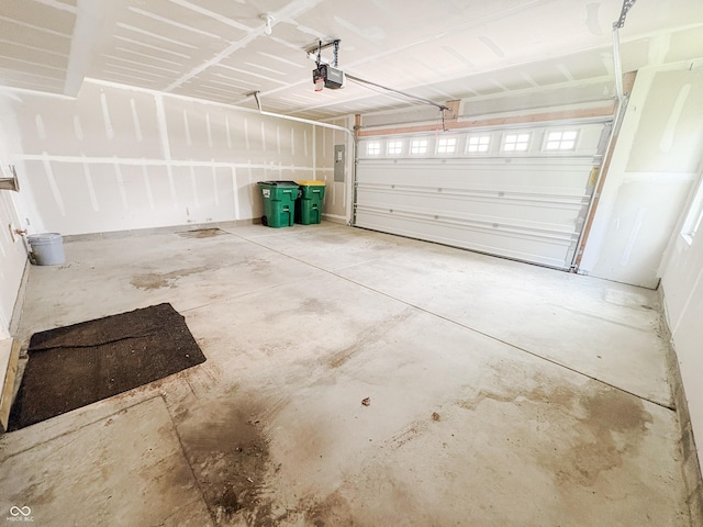 3522 Brampton Ln, Westfield, IN 46074 - garage featuring a garage door opener and electric panel
